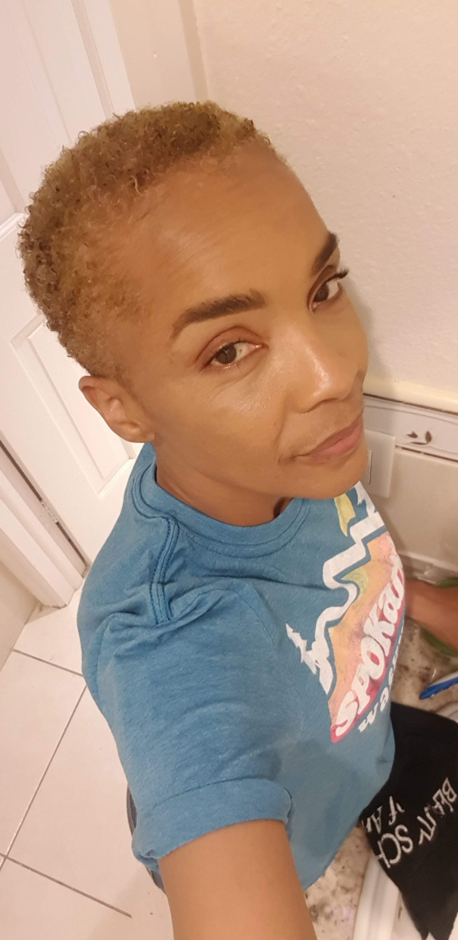 Anjanette in February 2022, early in her hair regrowth journey
